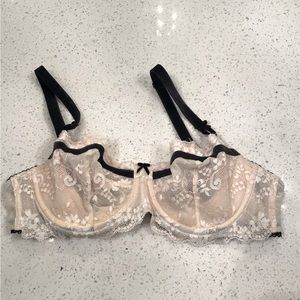 Victoria’s Secret tan, black, and white lace bra